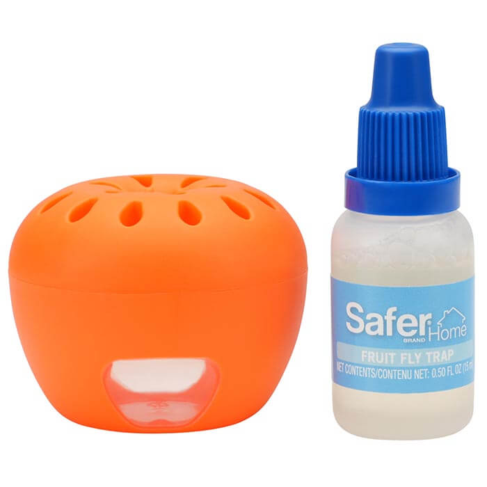 Safer Home Fruit Fly Trap with a small orange apple-shaped container and a white bottle, designed to lure and trap adult fruit flies.