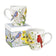 Holiday Antler Cat Boxed Mug featuring colorful bird-and-flower artwork on two ceramic mugs with a matching gift box, ideal for nature lovers.