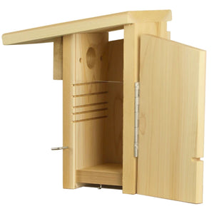 Interior of a cedar bluebird nest box with ventilation grooves and easy-access side door.