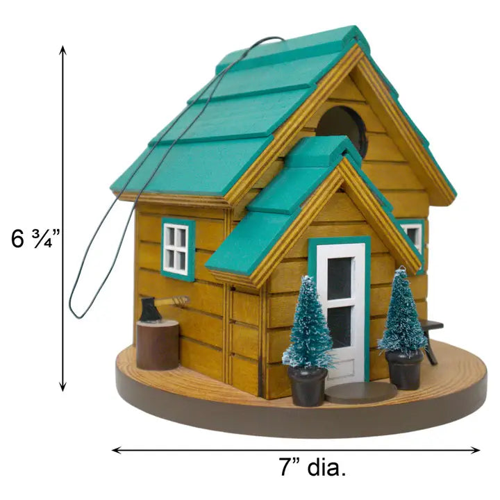 Cedar Point Cottage House with a small entry hole, windows, and a green roof, designed for bird nesting with drainage and ventilation features.