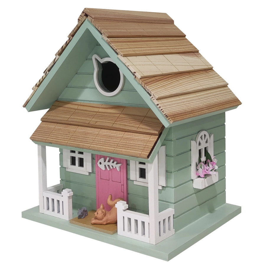 Kitty Cottage Birdhouse with cat statue on porch, cat-shaped window, designed for birds with clean-out and ventilation, featuring a 1.25″ entrance.