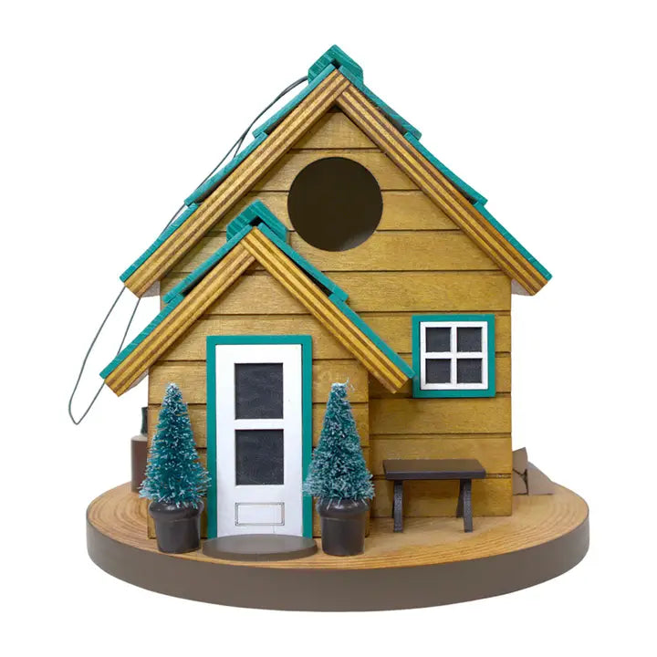 Cedar Point Cottage House birdhouse with tree designs, features a small entry hole, functional drainage, ventilation, and a hanging wire for backyard bird watching.